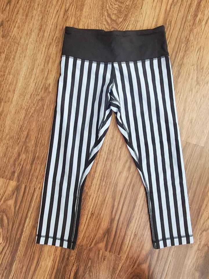 Lululemon Women's Cropped Leggings Size Purple and Black Stripe - Technical View